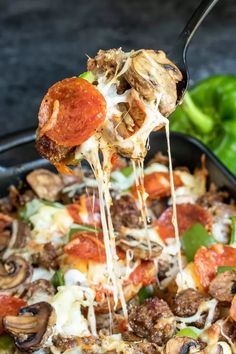 a close up of a slice of pizza on a spatula with the text low carb pizza casserole