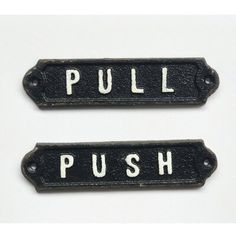 two black and white tags that say pull push