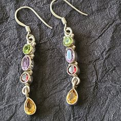 Dangle Multi Genuine Stone Earrings-Peridot, Citrine, Amethyst Stone Material: Peridot, Amethyst, Citrine, Garnet, Sterling Silver Dimension: 1.5 In Long New Without Tag Rare Earrings Sterling Silver Multi-stone Drop Earrings, Silver Multi-stone Drop Earrings, Silver Multi-stone Earrings For Gifts, Kate Spade Earrings Stud, Candy Corn Earrings, Vintage Gold Earrings, Dior Earrings, Beaded Chandelier Earrings, Face Earrings