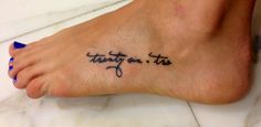 a person with a tattoo on their foot that says,'thank you this '