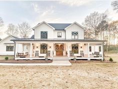 a large white house with two front porches