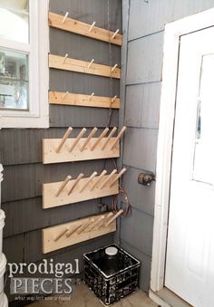 a bunch of shelves that are on the side of a house