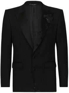 black virgin wool blend/silk blend Jacket floral appliqué peak lapels front button fastening jetted chest pocket two side flap pockets Trousers wide leg Black Silk Blazer With Lapel Collar, Black Silk Suits With Lapel Collar, Luxury Embellished Blazer With Notch Lapel, Luxury Embellished Outerwear With Notch Lapel, Black Silk Notch Lapel Suit, Designer Suits With Concealed Placket And Lapel Collar, Black Silk Suit With Notch Lapel, Black Silk Tuxedo For Evening, Black Silk Tuxedo For Evening Events