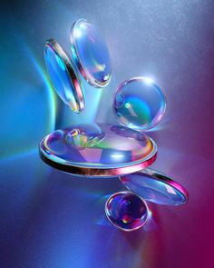 an abstract image of soap bubbles floating in the air on a blue, pink and purple background