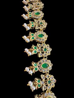 Gold plated Rani haar with earrings length of necklace -13.8 inches on each side length of earrings-1.2 inch stones - glass Polki or Cz Polki pearls / beads - fresh water pearls or real pearls plating - gold plated Elegant Green Tikka With Tilla Detail, Elegant Green Kundan Necklace With Latkans, Green Cutdana Tikka For Celebration, Green Hand Set Temple Jewelry Tikka, Hand Set Green Temple Jewelry Tikka, Elegant Green Bridal Necklace With Latkans, Bollywood Style Green Jeweled Bridal Necklace, Traditional Green Jeweled Jewelry Sets, Green Jeweled Bridal Necklace For Festivals