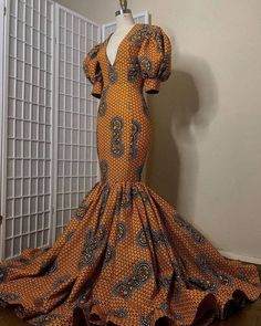 You can be as beautiful as that your friend or even more. This African print wedding dress is all you need.  Please drop your phone number for shipping,Also to enable your dress fit perfectly please provide your bust,waist,hip and length of dress measurements. Thank you! Ankara Fabric Maxi Wedding Dress, Fitted Yellow Maxi Skirt, Traditional Ankara Fabric Dress For Wedding, Yellow Fitted Long Gown, Fitted Orange Floor-length Dress, Orange Fitted Floor-length Dress, Elegant Ankara Maxi Dress For Wedding, Elegant Ankara Fabric Maxi Dress For Wedding, Yellow Fitted Maxi Gown