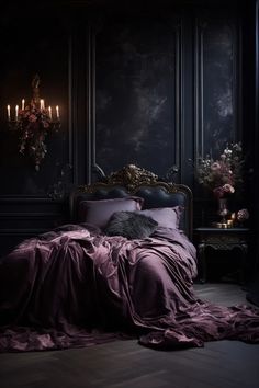 a bed with purple sheets and pillows in a dark room