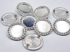 High-quality silver-tone brooch blanks with Austrian crystals. The inner diameter is 23mm and the outer is 32mm. You will receive 9 pieces. I have other unique pieces for jewelry making available in my shop. Silver Rhinestone Round Brooches, Silver Round Brooches With Rhinestones, Glass Gems, Glass Rings, Lace Edging, Austrian Crystal, Mosaic Glass, Beautiful Earrings, Antique Silver