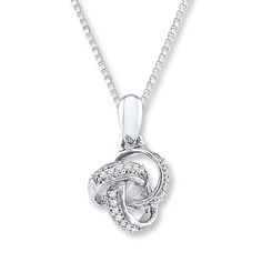 Ribbons of sterling silver outlined in diamonds swirl to form a knot as the centerpiece of this attractive necklace for her. Totaling 1/20 carat in diamond weight, the pendant swings from an 18-inch box chain secured with a lobster clasp. Kay Necklace, Diamond Knot Necklace, Diamond Knot, Jewelry Advice, Necklace For Her, Knot Necklace, Accessories Jewelry Necklace, Gorgeous Necklaces, Box Chain