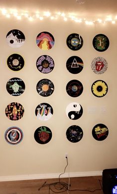 a wall with many different types of records on it