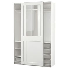 a white closet with two doors and shelves