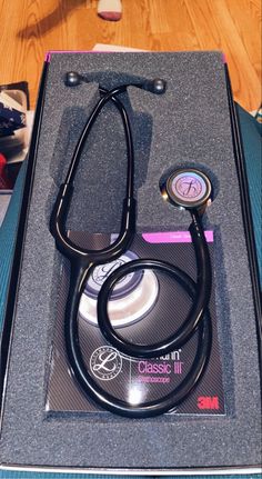 a stethoscope sitting on top of a box