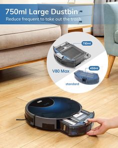 the robot vacuum is on the floor with instructions to use it