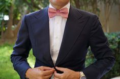 Classically refined, the Nude Pink Velvet Bow Tie adds a romantic perspective to your formal styles. The most popular men’s bow tie for weddings, the Nude Pink Velvet Pre-tied Bowtie exudes an elegant soft pink palette. Designed in-house and superbly handcrafted from a plush velvet, the Nude Pink Velvet Bow Tie immaculately combines a perspective of durability with unsurpassed luxury. Let its smooth, lightly tufted velvet fabric bring a wealth of comfort and texture to your formal styles. The Nu Bowties Men's, Men's Bow Ties, Pink Pocket Square, Texture Socks, Rose Gold Cufflinks, Velvet Bow Tie, Dusty Rose Wedding, Pink Bow Tie, Pink Palette