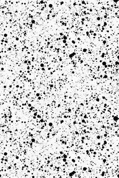 an abstract black and white background with dots