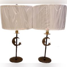 two lamps that are sitting next to each other