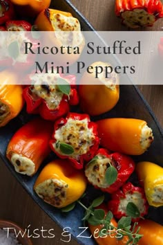 stuffed mini peppers are on a plate with the words ricotta stuffed mini peppers above them