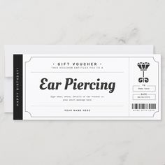 a gift voucherr with the word ear piercing on it in black and white