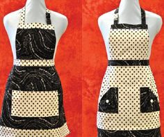 two aprons with black and white polka dots on them, one in the shape of a woman's torso