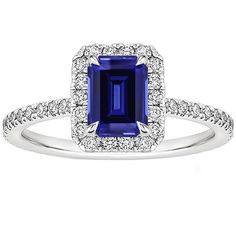 a blue sapphire and diamond ring in white gold