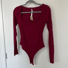 New With Tags Casual Red Bodysuit For Fall, Red Fitted Bodysuit For Winter, Fitted Red Bodysuit For Winter, Red Stretch Bodysuit For Loungewear, Red Long Sleeve Bodysuit For Fall, Trendy Red Long Sleeve Bodysuit, Red Casual Bodysuit For Spring, Casual Red Bodysuit For Spring, Red Long Sleeve Bodysuit For Spring