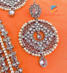 Silver Polki and Stones Long Rani Haar Necklace Earrings Tikka Set Available to be shipped for FREE from Canada to USA, Europe, Italy, Norway and everywhere else. Explore more PUNJABI BRIDAL JEWELLERY SETS 👉 PUNJABI BRIDAL JEWELLERY ONLINE 🛒 INDIAN BRIDAL JEWELLERY 📦Unmatched FREE Worldwide Shipping Sukhpal, Canada ⭐️⭐️⭐️⭐️⭐️ Hello Kiran Our order arrived today and we absolutely love every piece. Everything is so beautiful. My daughter loves her nose ring. We can’t wait to shop with you more Jewelry With Matching Round Pendant Earrings For Wedding, Matching Earrings With Round Pendant For Wedding, Silver Costume Jewelry Earrings For Celebration, Wedding Costume Jewelry For Pierced Ears, Silver Chandbali Jewelry Sets For Gift, Silver Costume Jewelry Sets For Festivals, Traditional Round Pendant Earrings For Wedding, Bridal Silver Necklace With Matching Earrings For Festivals, Silver Bridal Necklace With Matching Earrings For Festivals