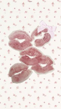 pink lips with bows and flowers on a white background