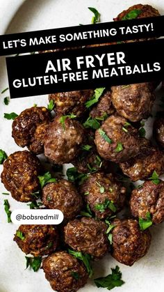 some meatballs are on a white plate with green leaves and the words let's make something tasty air fryer gluten - free meatballs