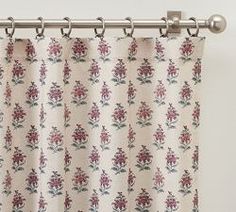 a curtain with floral designs on it