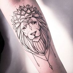 a black and white tattoo of a lion with a crown on it's head