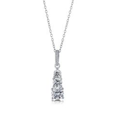 This 3-stone graduated pendant necklace is the perfect anniversary gift to mark 3 wonderful years together and many more to come. Crafted with sterling silver, rhodium plated, stamped 925, nickel free. Set with premium quality 1.74 carat total cubic zirconia. Chain measures 18" in length. Pendant measures 1" (L), 0.28" (W). Spring ring clasp. 3 Stone Pendant, Anniversary Necklace, Graduation Necklace, Cz Necklace, Cz Pendant, Stone Pendant Necklace, Polish Jewelry, Stone Pendant, Bar Necklace