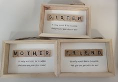 two framed scrabbles with words that spell out the word mother and friend