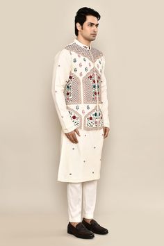 Ivory bundi with thread, sequin embroidery in mughal floral pattern. Paired with floral embroidered kurta and pant pyjama. - Aza Fashions Wedding Nehru Jacket With Mirror Work, Traditional Beige Nehru Jacket With Zari Work, White Traditional Festive Bandhgala, Traditional White Bandhgala For Festive Occasions, Off White Bandhgala For Festive Occasions, Festive Off White Bandhgala, Festive Off-white Bandhgala For Transitional Season, Traditional Off White Bandhgala With Chikankari Embroidery, Nehru Jacket With Mirror Work For Diwali Wedding