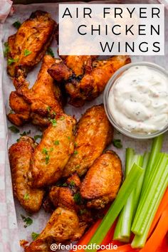 air fryer chicken wings with celery, carrots and ranch dressing on the side