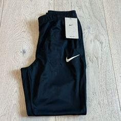 Nike Standard Fit Warmup Pants Brand New With Tags Women’s Size Small Dri-Fit Technology 100% Polyester Waist Measurement: 13.5” Inseam: 27” 10” High Rise Offers Welcome Bundle & Save 30% Discounted Shipping Nike Bottoms With Side Pockets, Nike Straight Leg Workwear Bottoms, Nike Trousers With Side Pockets, Nike Trousers For Workwear, Nike Straight Leg Sports Bottoms, Nike Bottoms With Elastic Waistband, Nike Stretch Pants With Pockets, Nike Wide Leg Sports Bottoms, Nike Black Tapered Leg Pants