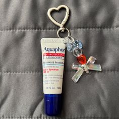 Brand New Aquaphor lip protectant and sunscreen .35 fl oz. Made into the perfect keychain for on the go application! Mini Aquaphor, Aquaphor Lip Balm, Lip Gloss Keychain, Aquaphor Lip, Keychain Clay, Chapstick Keychain, Altoids Wallet, Bored Ideas, Lip Balm Keychain