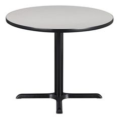 a round table with black base and white top