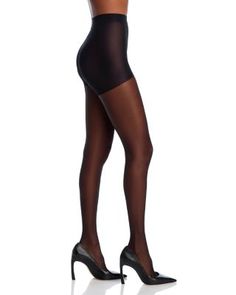 A silky sheer leg with control top for a slim silhouette. Sleek Sheer Stretch Legwear, Sleek Tight Hosiery For Night Out, Elegant Sheer Tights For Night Out, Sleek Sheer Stretch Bottoms, Sleek Stretch Sheer Bottoms, Sheer Stretch Legwear For Night Out, Sheer Stretch Tights For Night Out, Sleek Stretch Tights For Night Out, Sleek Tight Legwear For Night Out