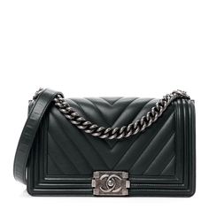 This is an authentic CHANEL Lambskin Chevron Quilted Medium Boy Flap in Black. This stylish shoulder bag is crafted of luxurious chevron quilted caviar leather in black with linear quilted border. The bag features a ruthenium chain-link shoulder strap with a leather shoulder pad, and a ruthenium boy CC push lock on the front. This opens the bag to a gray fabric interior with a patch pocket. Chanel Boy Bag Black, Cc Card, Chanel Print, Chanel Crossbody, Chanel Tweed, Medium Sized Bags, Border Frame, Chanel Shoulder Bag, Chevron Quilt