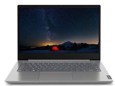 an open laptop computer sitting on top of a white table next to a red light