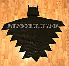 an image of a black cat rug on the floor