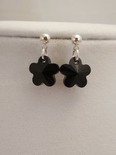 The Earrings are Very Fancy Style, Silver Plated Ear stud with Black Flower Swarovski Crystal When it dangles, it makes twinkle around your ears Size - Dangle H: 1.5cm, W: 1cm(Flower Width) All pieces come Fancy Gift Wrapped. ALL ORDERS ARE SHIPPED VIA USPS FIRST CLASS WITH TRACKING. IF YOU NEED EXPIDITED SHIPPING PLEASE CONVO ME SO THAT I MAY ADJUST THE POSTAGE PRICE. IT IS VERY GOOD * with Casul or Formal wear * with Any Occasional Dress * Gift for Bride * Gift for Bridemaid * Gift for Sister Bridemaids Gifts, Fancy Gifts, Choker Style, Ear Stud, Swarovski Crystal Earrings, Black Flower, Pearl Choker, Bridal Necklace, Pink Glass