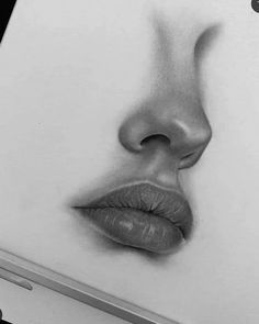 a pencil drawing of a woman's face with her eyes closed and lips slightly open