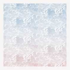 the sky is filled with white clouds in pastel colors, and it appears to be pink or blue