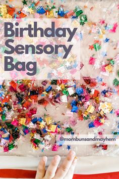 someone holding up a birthday card with the words happy birthday, sensory bag