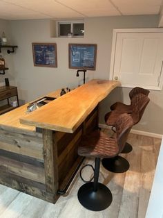 a home bar made out of pallet wood