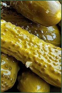 cucumbers covered in oil and water sitting on top of each other