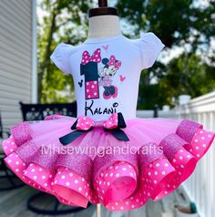 a pink and white minnie mouse birthday outfit