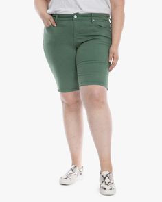 These super soft and chic denim Bermuda shorts are done in a pretty summery green and have five pockets. Try them with a tee or peasant blouse and mules. These plus-size shorts are ready for summery weather, comfy tees, and flirty cutout tops. Slink Jeans Haley Mid rise Bermuda | Light Green | Jeans | Materials & Care Instructions: ['58% Cotton, 39% Rayon, 3% Spandex', 'Machine wash cold', 'Imported'] Stretch Knee-length Bermuda Shorts For Spring, Stretch Bermuda Shorts For Spring, Casual Green Knee-length Bottoms, Spring Stretch Bermuda Shorts, Stretch Knee-length Jean Shorts For Spring, Stretch Knee-length Bermuda Shorts For Summer, Green Knee-length Bottoms For Day Out, Green Cotton Knee-length Bottoms, Knee-length Green Bottoms For Day Out