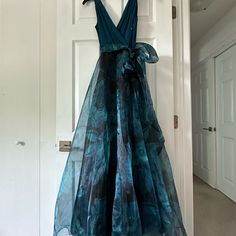 This Beautiful Teal Evening Dress About Size 7/8. It’s A European Size 2. The Breast Area Can Expand Up To 36c Breast Size. The Length Can Go From Maxi To Midi Depending On The Persons Height. Elegant And Feminine, Flows With 4 Layers Of Material Under To Create Cinderella Taffeta Look. Waist 26” Max. Brand New, Never Worn. Retails $248. Teal Formal Dress, Blue Sheer Dress, Von Maur, Size 8 Dress, Prom Dresses Long, Formal Dress, Dresses Long, Evening Dress, Blue Dresses